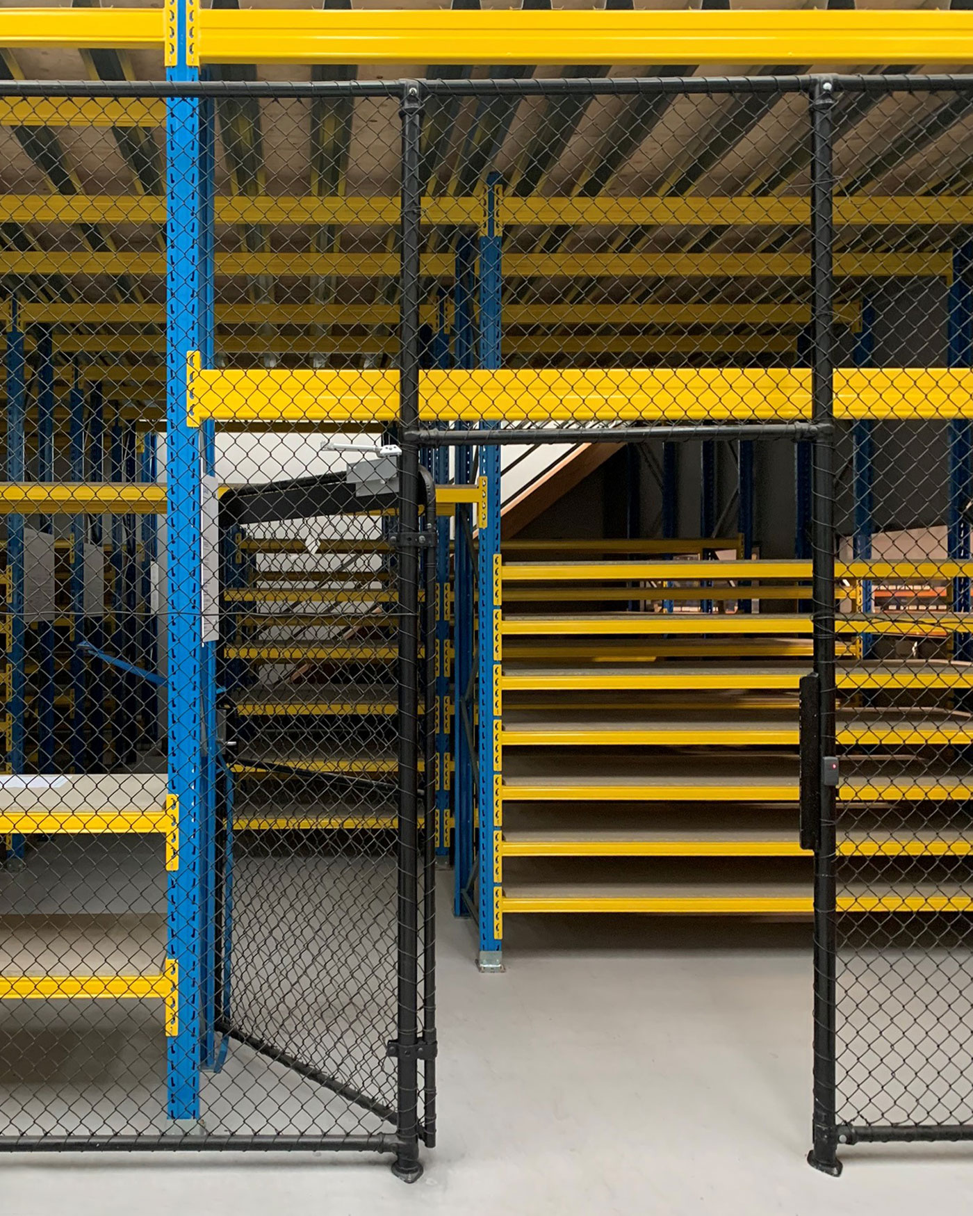 Small parts warehouse with raised storage